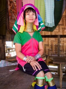 Kayan woman. Neck rings