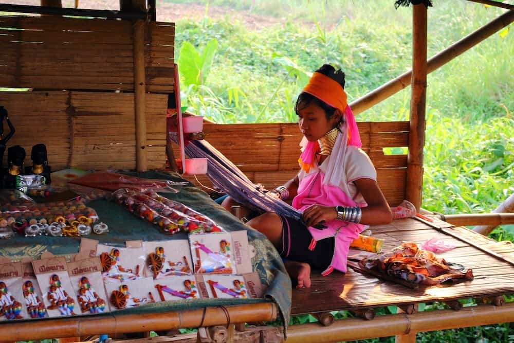 Kayan girl working